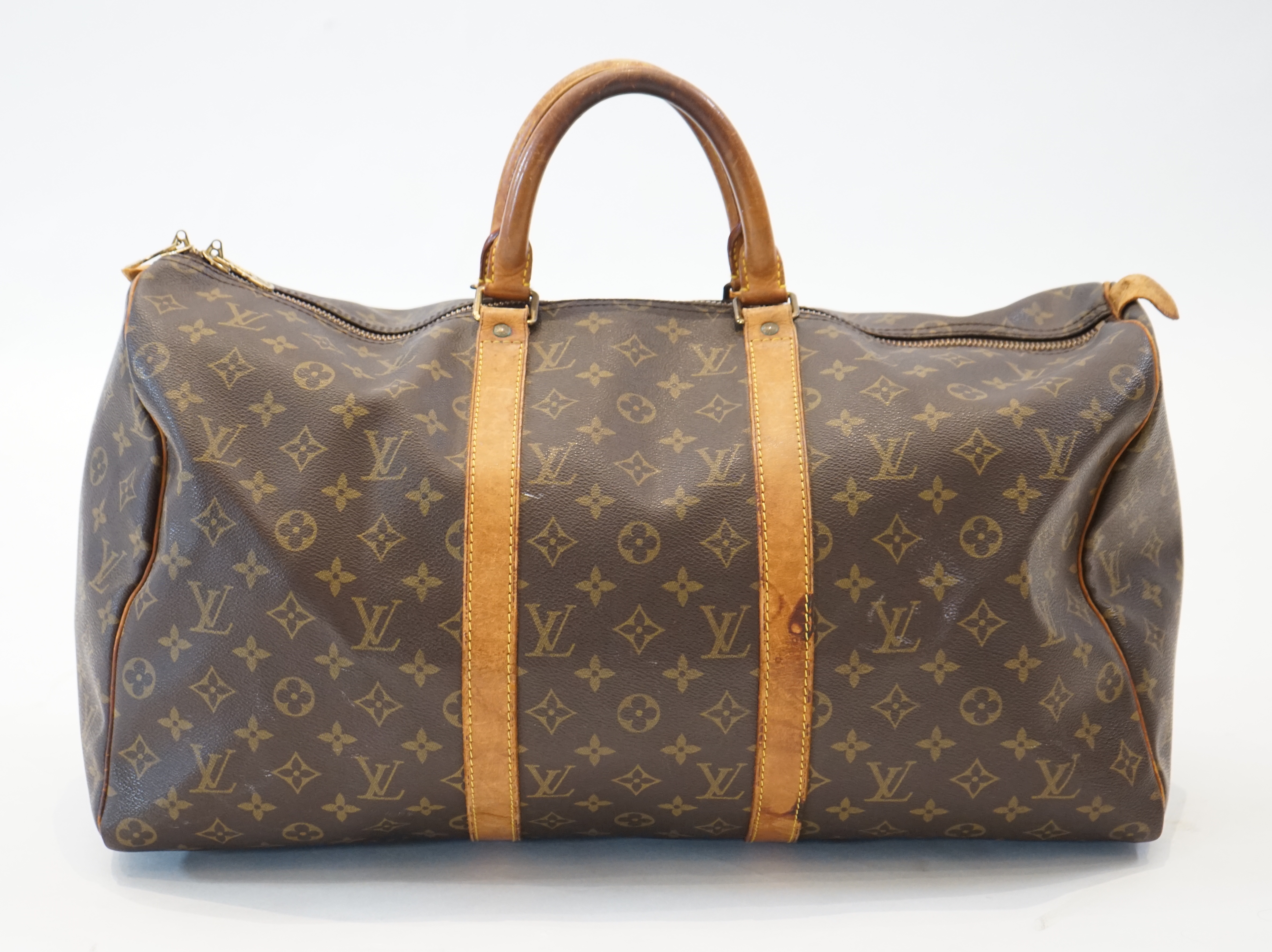 A Louis Vuitton Speedy 40 bag width 22cm, length 51cm, height 28cm